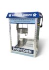 Eine blaue Popcornmaschine mit Glasscheiben. Oben steht "POPCORN DREAMS" drauf. Darunter "DELIIOUS WONDER" und ganz unten "POPCORN"